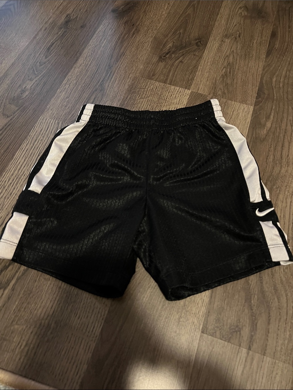 Nike Kids Black Athletic Shorts with White Side Panels